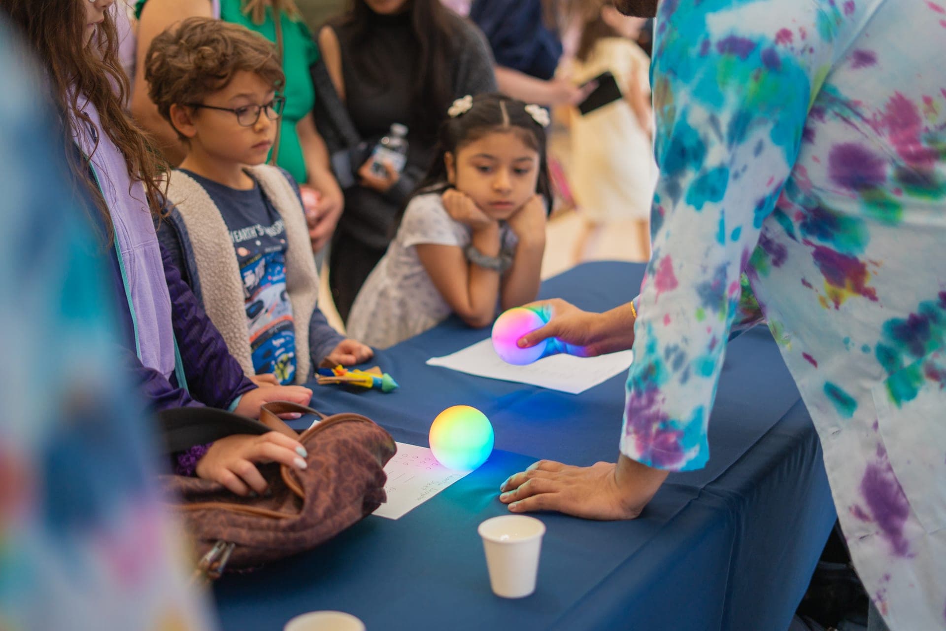 Kids captivated by a Qubi demo